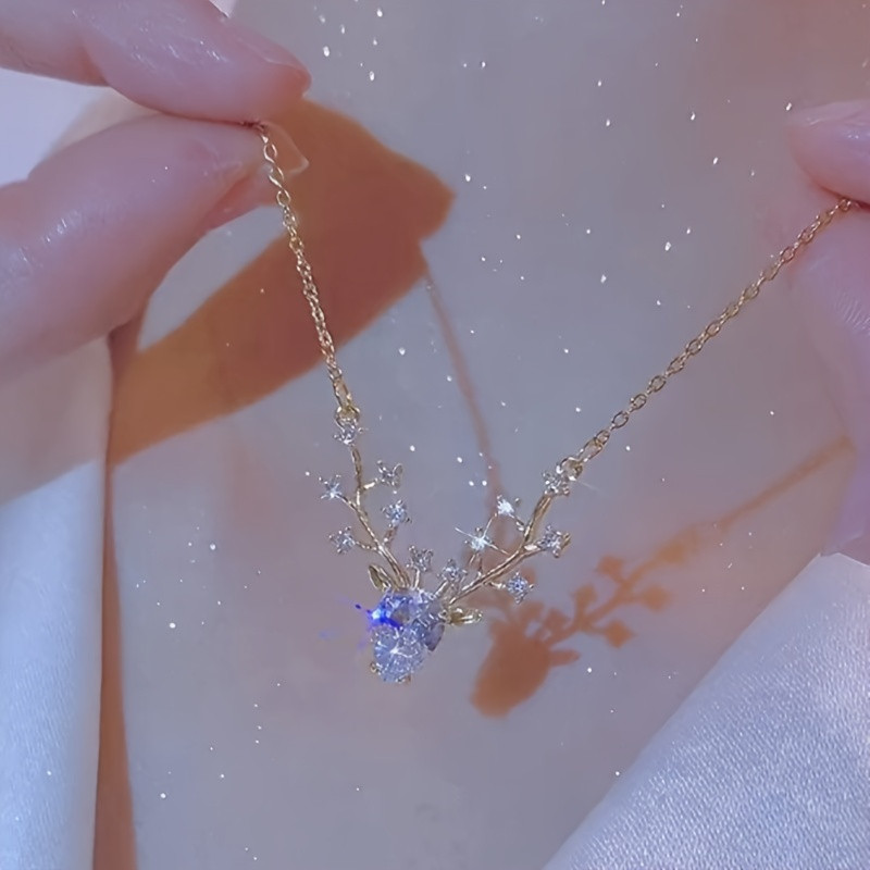 قلادة غزال أنيقة مرصعة بكريستال صناعي استانليس ستيل