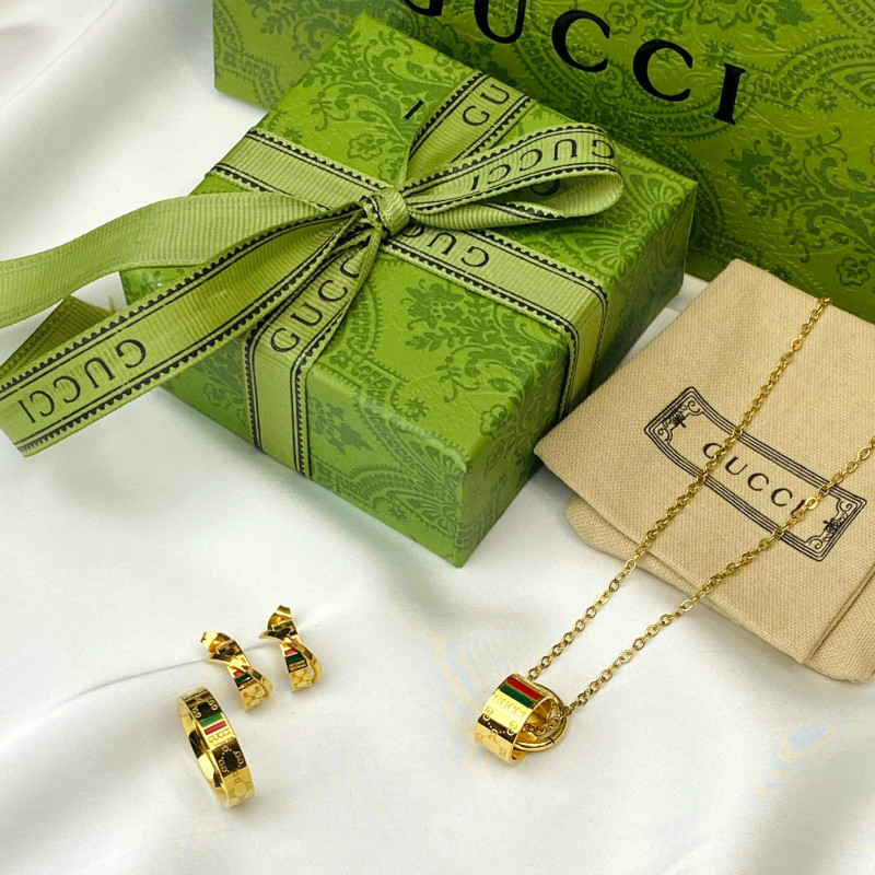 طقم اكسسوار من جوتشي اسطواني ذهبي , ستانليس استيل